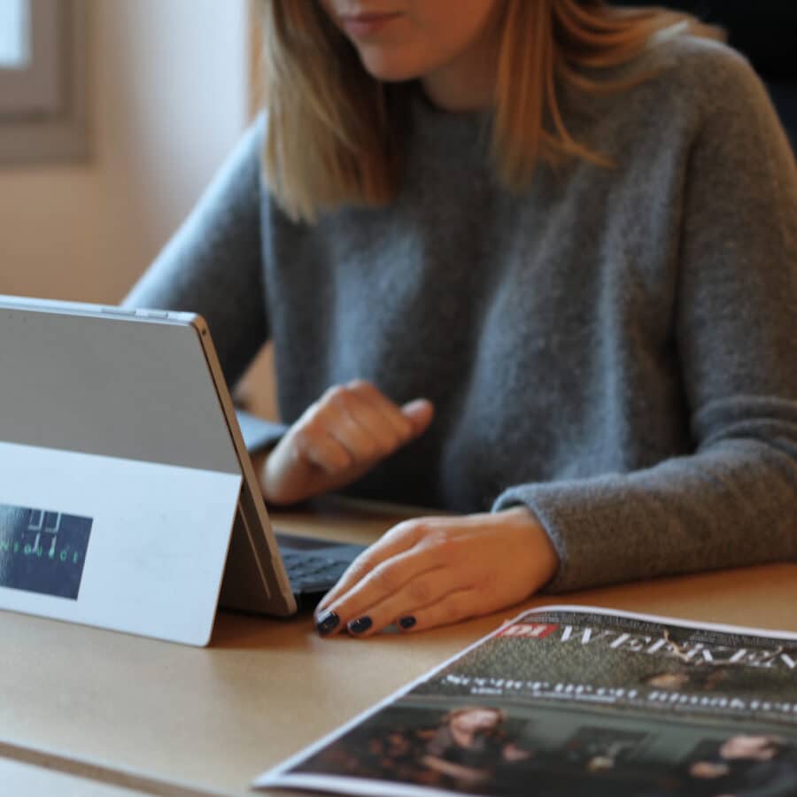 Consultant in front of computer